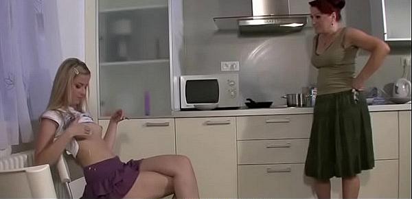  Lesbian mom and teen fucking in the kitchen